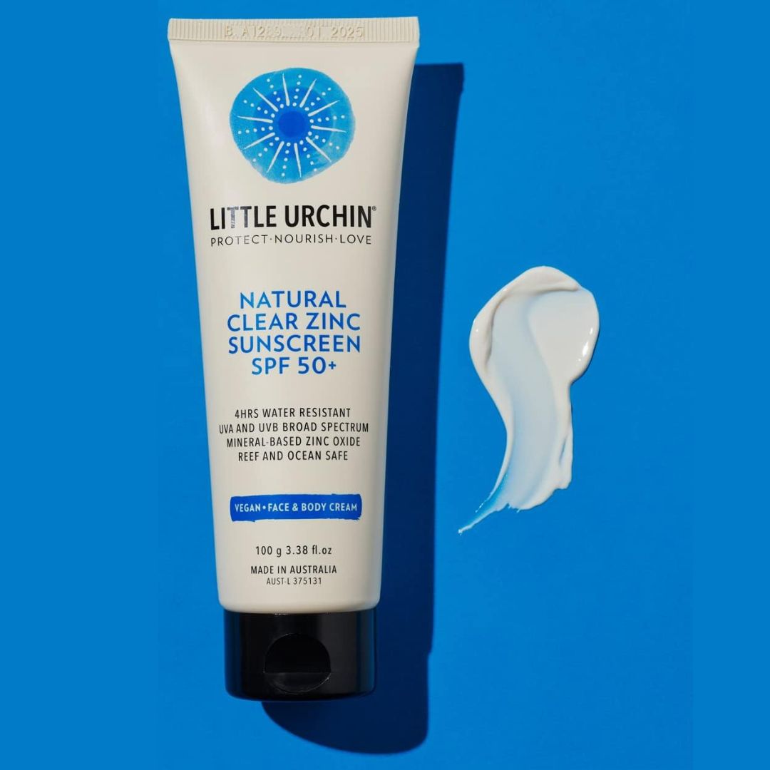 Australian made LITTLE URCHIN  physical sunscreen with Vegan fragrance free formula swatch on blue background