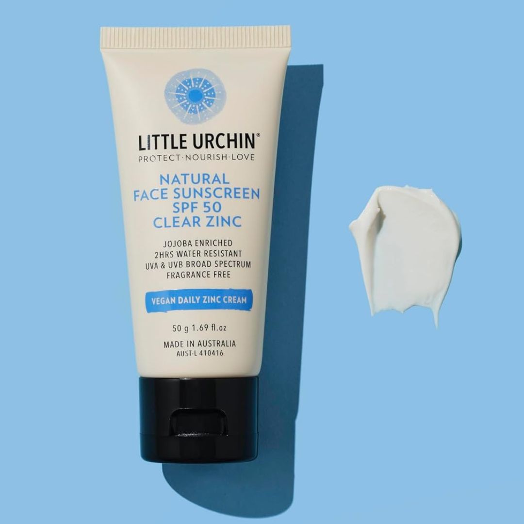 Australian made LITTLE URCHIN  physical sunscreen for Face with Vegan fragrance free formula swatch on light blue background