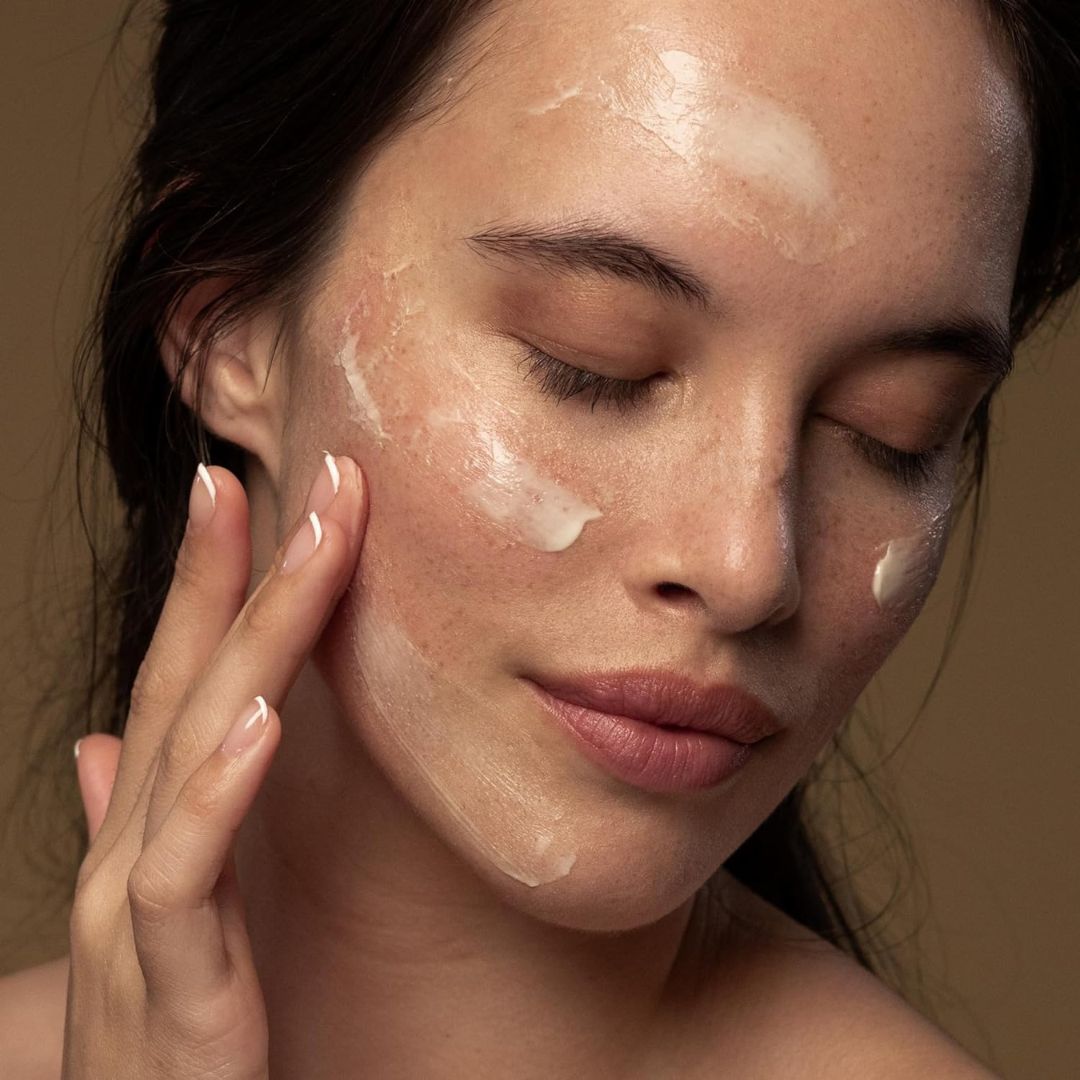 women applying Best Night Cream from Antipodes