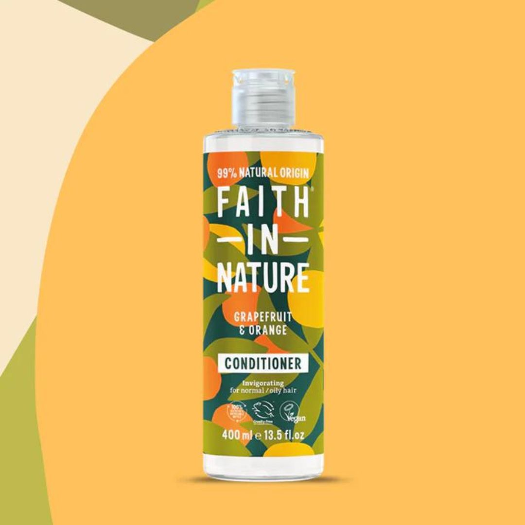 Faith In Nature Vegan Conditioner - Grapefruit & Orange on a yellow, beige and green background.