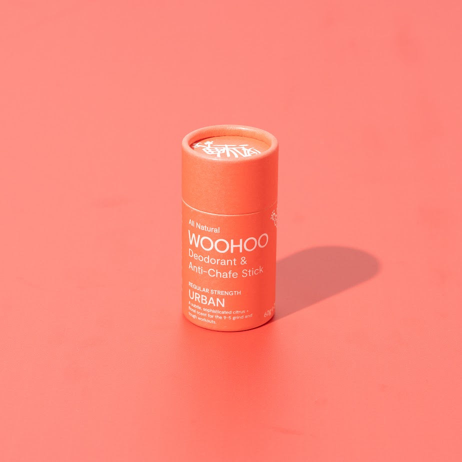 Image of Urban Natural Deodorant Stick in sustainable packaging  on a deep rose background